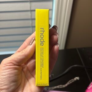 RHODE Bright Yellow Lip Treatment in Passionfruit jelly